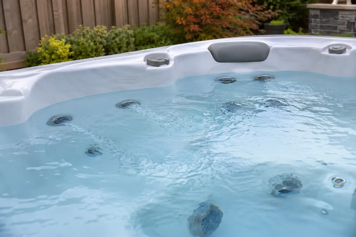 Hot tub jets producing water flow in a residential spa